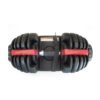 An adjustable dumbbell with a black and red handle, resting on a holding tray. The dumbbell has several weight plates attached on both sides and numbers indicating weight increments.